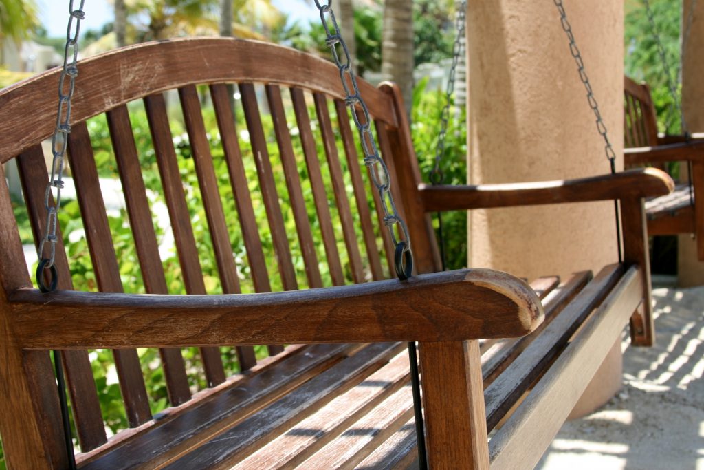  Porch swing added to an outdoor living space