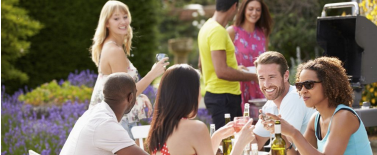 Neighbors enjoying neighborhood summer barbecue