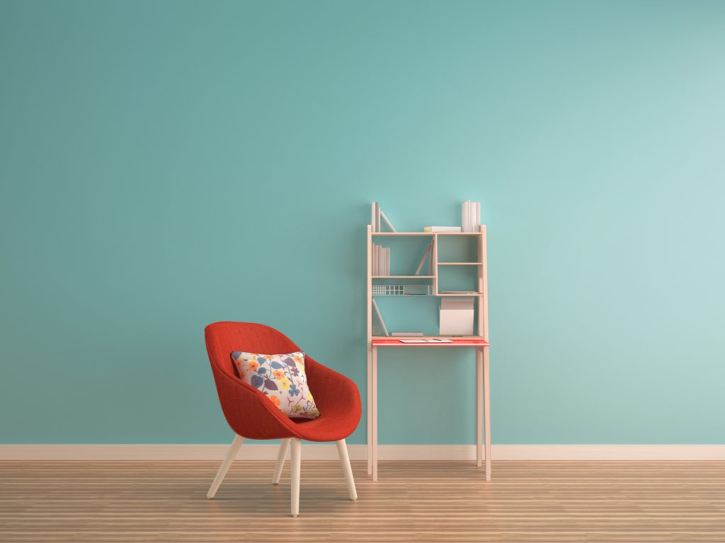 Red chair and home décor in a summer colored room