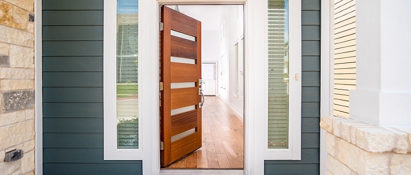 Modern front door and exterior of Eastwood at Riverside affordable home in Austin.