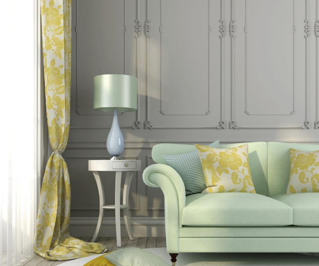 Yellow pillows and drapes with green as one of the summer color trends