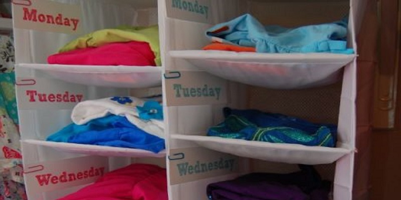 A hanging closet organizer for back-to-school clothes each day of the week.