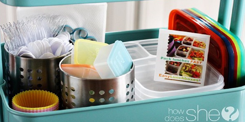 A back-to-school lunchbox station with supplies.