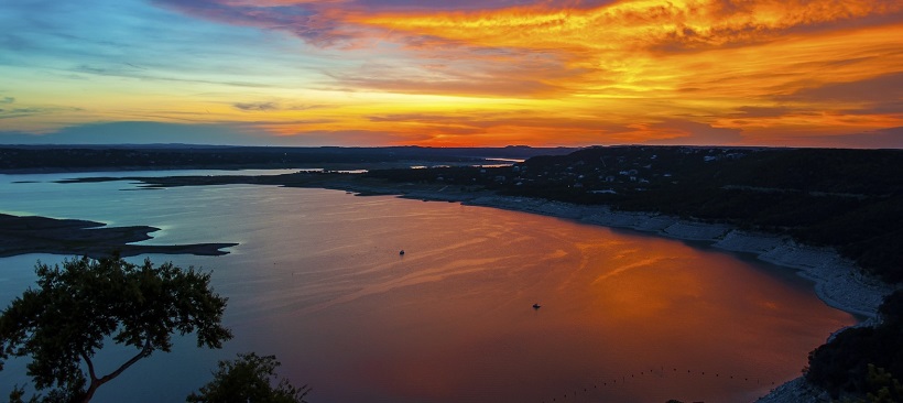 Sunset view of Lake Travis with lots of things to do in Cedar Park