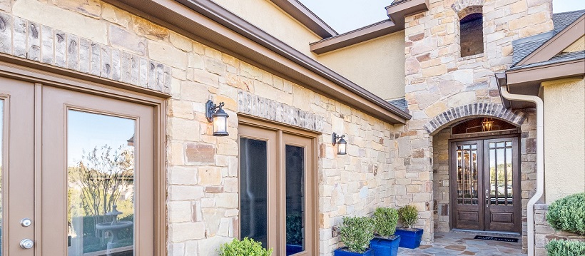 Exterior of a new Austin home with brick and stucco