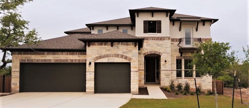 Cedar Park real estate example of the two-story stone and brick Lantana exterior at Trento.