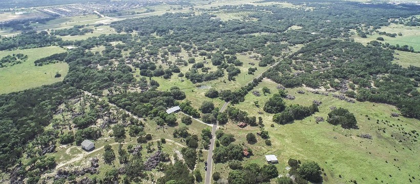 Bird’s eye view of Cedar Park real estate and Hill Country.