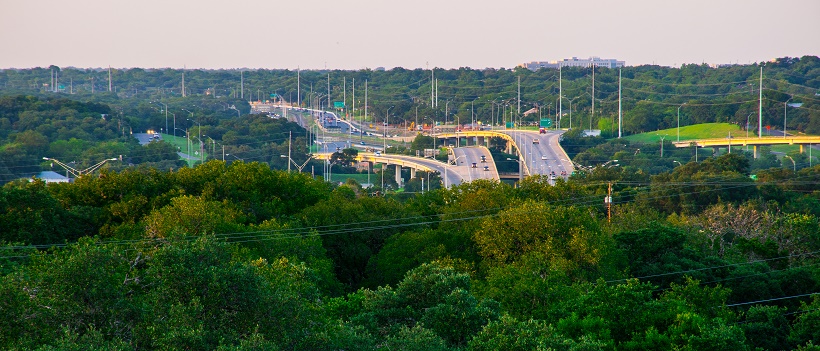 View of South Austin and highway surrounded by greenery and trees.