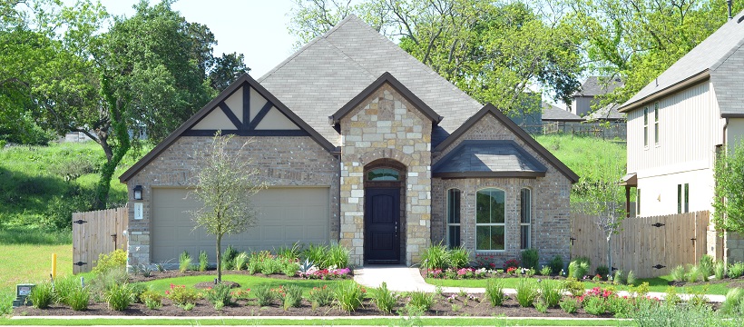 Front exterior of one of the south Austin homes for sale at The Hills of Bear Creek.