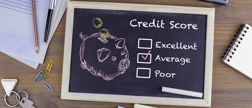 Chalkboard that says “Credit Score” and boxes with options for “Excellent”, “Average”, and “Poor” and “Average” is checked.